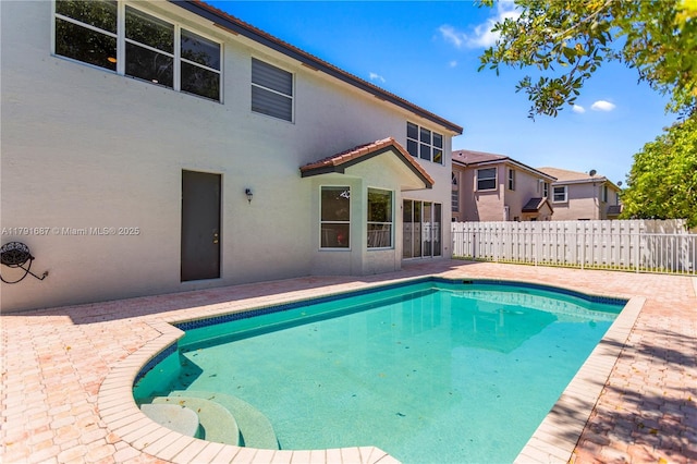 17937 SW 36th St, Miramar, FL 33029 - view of swimming pool featuring fence, a fenced in pool, and a patio