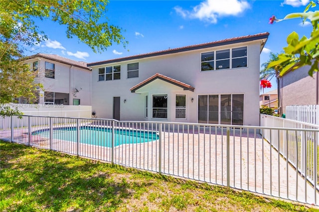 17937 SW 36th St, Miramar, FL 33029 - rear view of house with a fenced backyard, a patio, and stucco siding