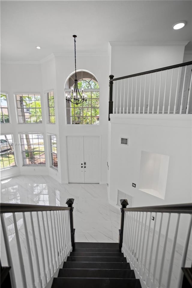 17937 SW 36th St, Miramar, FL 33029 - stairs featuring recessed lighting, visible vents, ornamental molding, and a towering ceiling