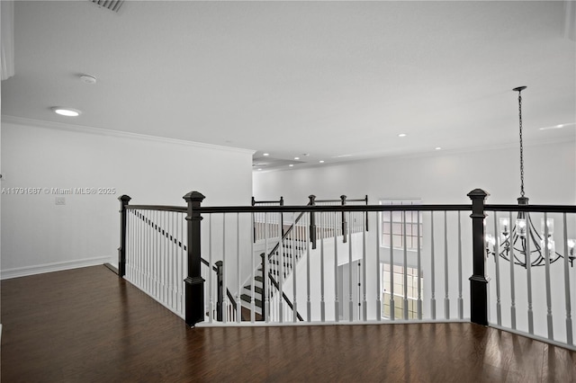 17937 SW 36th St, Miramar, FL 33029 - hall with an inviting chandelier, ornamental molding, wood finished floors, and an upstairs landing