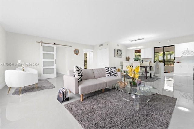 7153 Promenade Dr Unit 302, Boca Raton, FL 33433 - tiled living room with a barn door