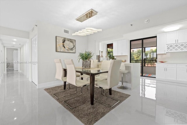 7153 Promenade Dr Unit 302, Boca Raton, FL 33433 - dining area featuring baseboards