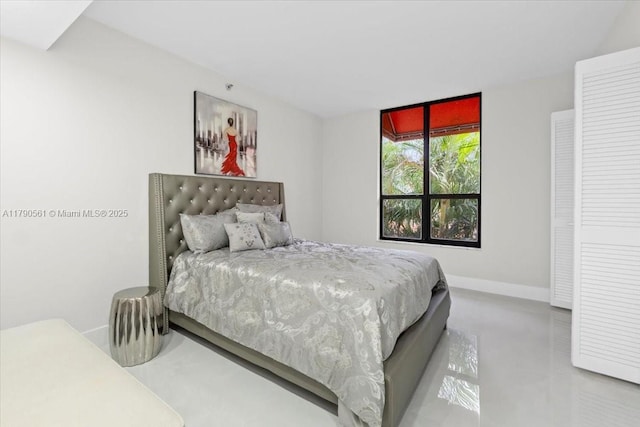 7153 Promenade Dr Unit 302, Boca Raton, FL 33433 - bedroom featuring baseboards