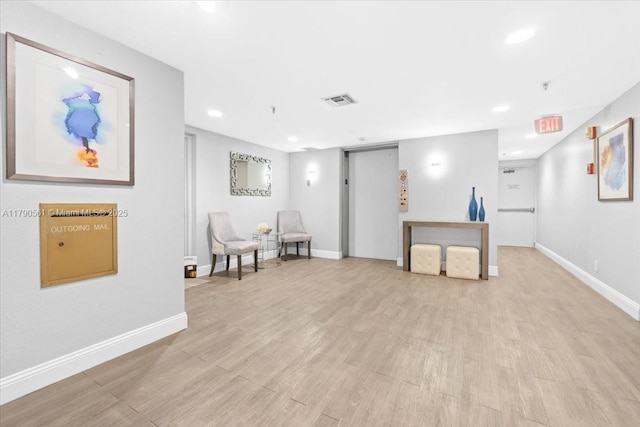 7153 Promenade Dr Unit 302, Boca Raton, FL 33433 - living area featuring recessed lighting, light wood-type flooring, and baseboards