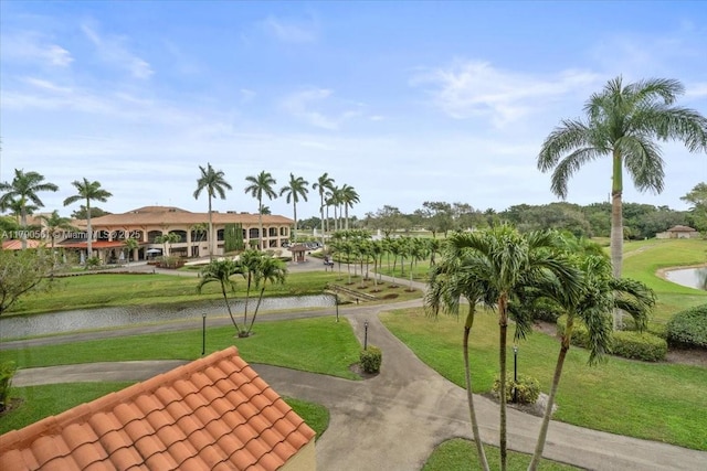 7153 Promenade Dr Unit 302, Boca Raton, FL 33433 - view of property's community featuring a water view and a lawn