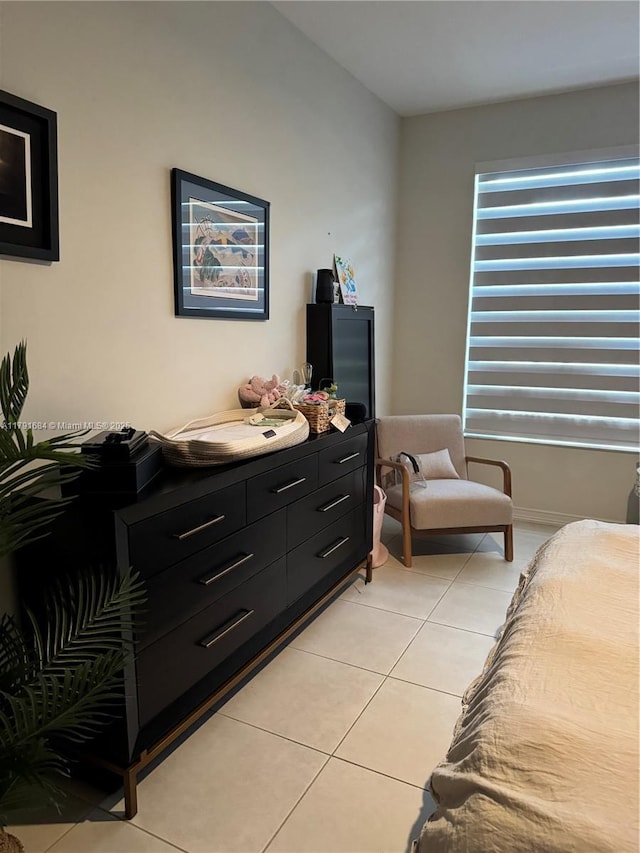 15533 N Miami Lakeway N Unit 101-19, Miami Lakes, FL 33014 - bedroom with light tile patterned floors