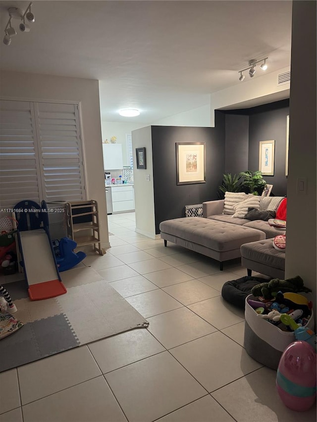 15533 N Miami Lakeway N Unit 101-19, Miami Lakes, FL 33014 - living room with rail lighting and light tile patterned floors