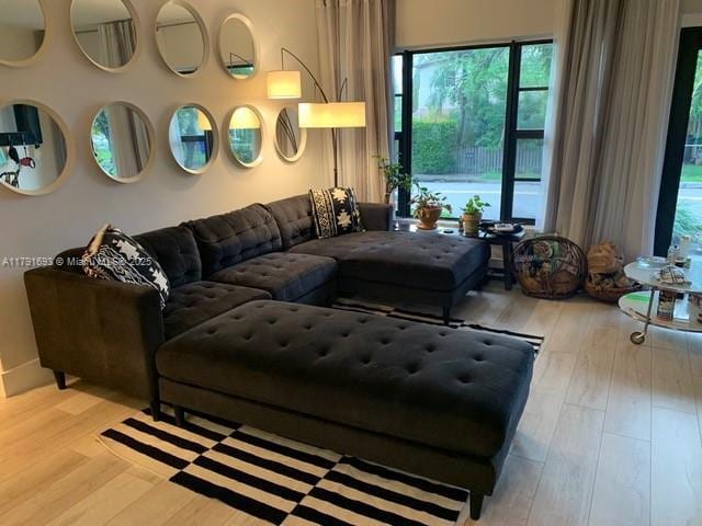 2 NE 44th St, Miami, FL 33137 - living room with wood finished floors and plenty of natural light