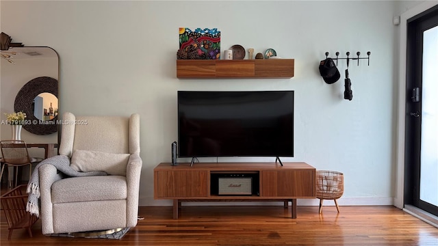 2 NE 44th St, Miami, FL 33137 - living room with baseboards, wood finished floors, and plenty of natural light