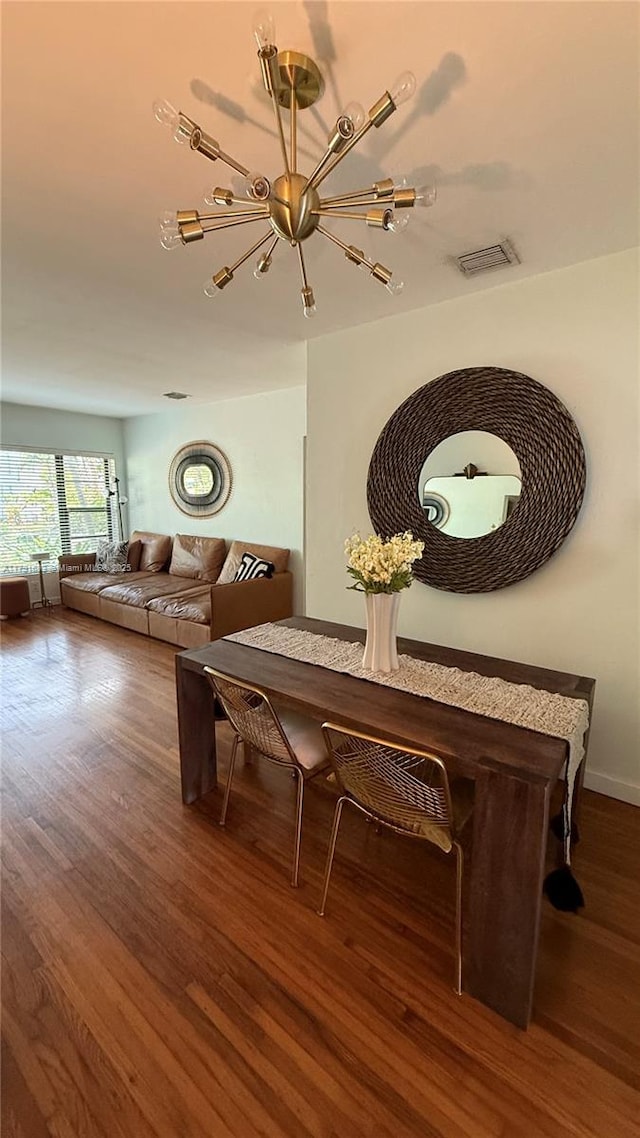 2 NE 44th St, Miami, FL 33137 - dining area featuring a notable chandelier, wood finished floors, and visible vents