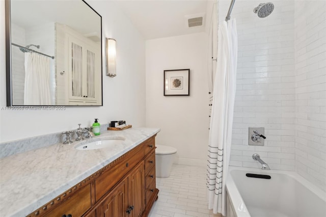 4700 Alhambra Cir, Coral Gables, FL 33146 - full bath with shower / tub combo, visible vents, toilet, tile patterned floors, and vanity
