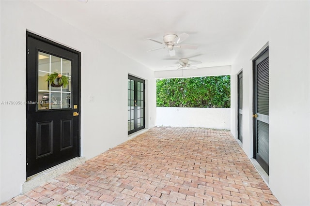 4700 Alhambra Cir, Coral Gables, FL 33146 - view of patio with ceiling fan and french doors