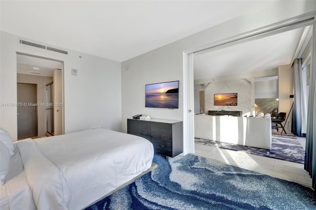 bedroom featuring visible vents