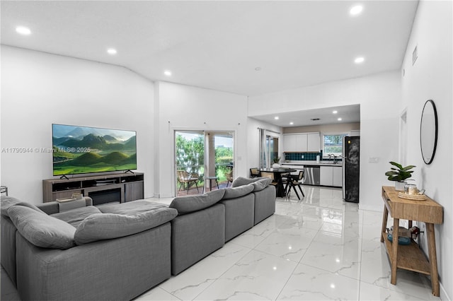 2215 SE 7th Pl, Homestead, FL 33033 - living room with visible vents, recessed lighting, and marble finish floor