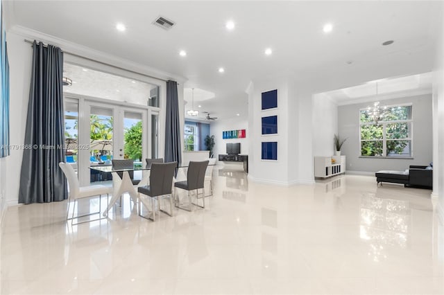 13003 SW 41st St, Davie, FL 33330 - tiled dining room with crown molding, french doors, baseboards, a chandelier, and recessed lighting