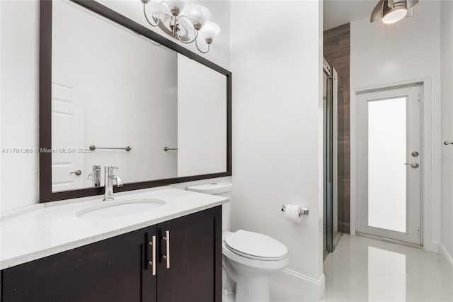 full bath featuring a shower with door, baseboards, toilet, tile patterned floors, and vanity