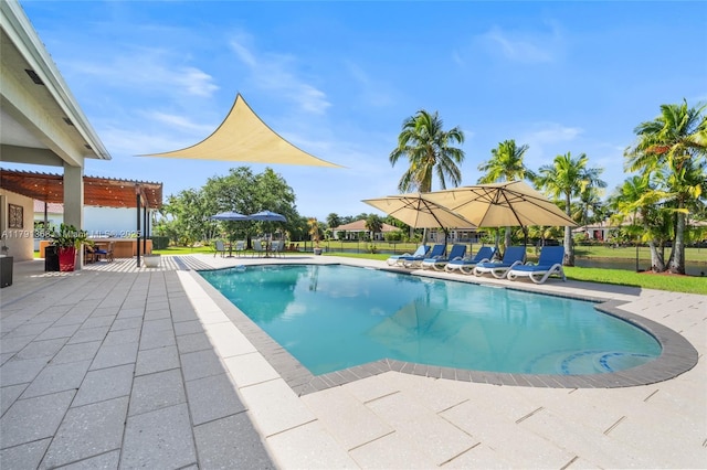 outdoor pool featuring a patio area