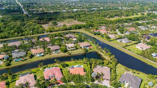 13003 SW 41st St, Davie, FL 33330 - aerial perspective of suburban area with property parcel outlined and a large body of water