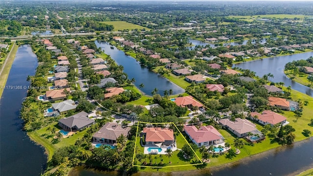 13003 SW 41st St, Davie, FL 33330 - aerial perspective of suburban area with property boundaries highlighted and a large body of water