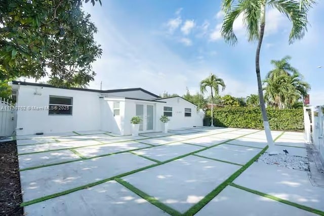 back of house featuring a patio