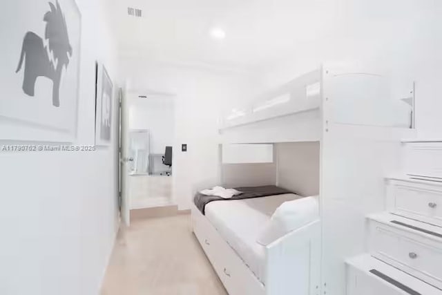 bedroom with visible vents