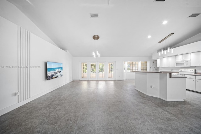 unfurnished living room featuring visible vents, recessed lighting, and high vaulted ceiling