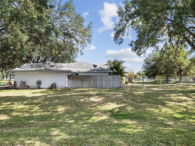 view of yard with fence