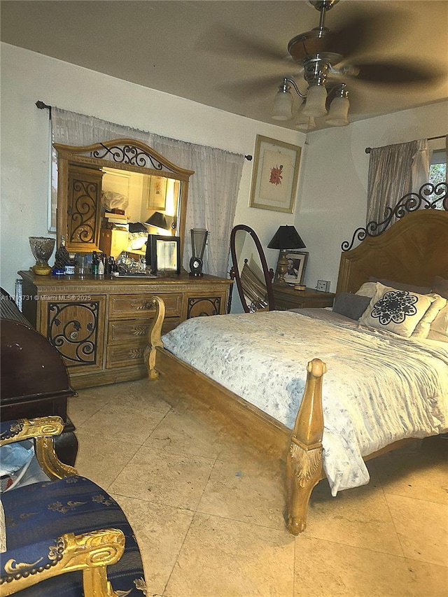 1540 NE 173rd St, North Miami Beach, FL 33162 - bedroom with tile patterned floors and a ceiling fan