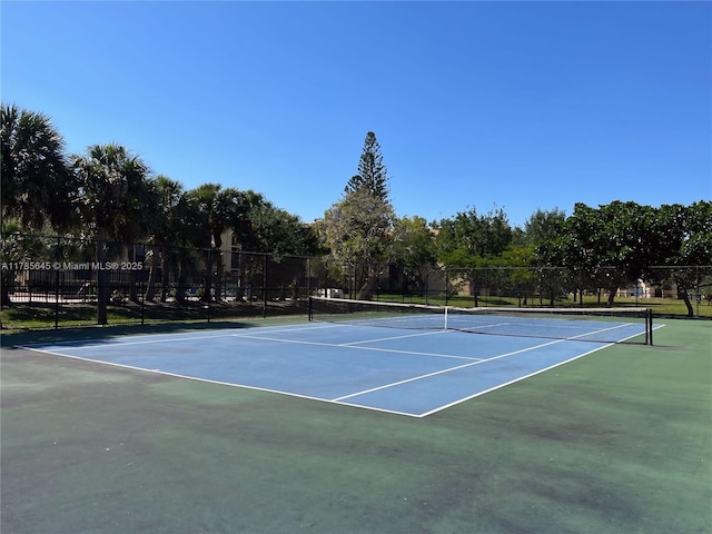 2091 Coral Ridge Dr Unit N306, Coral Springs, FL 33071 - view of tennis court with community basketball court