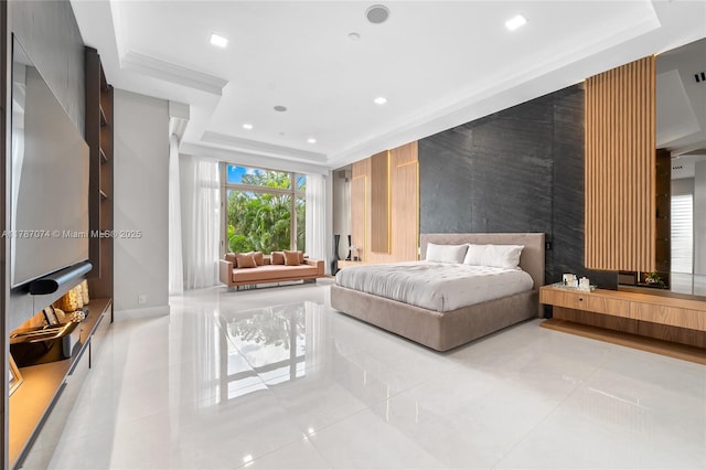 tiled bedroom featuring an accent wall, recessed lighting, and a tray ceiling