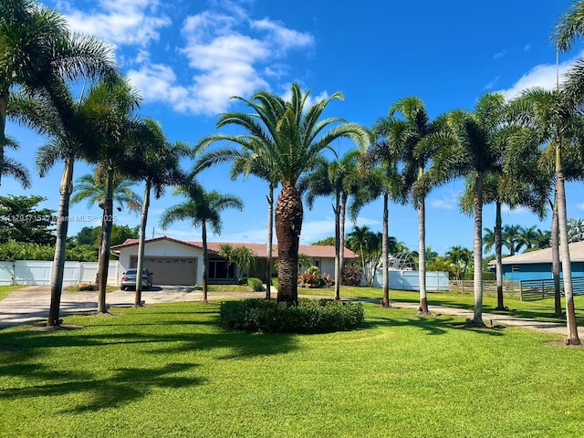 14051 SW 15th Ct, Davie, FL 33325 - view of home's community with a garage