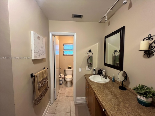 14051 SW 15th Ct, Davie, FL 33325 - bathroom featuring vanity, toilet, and tile patterned floors