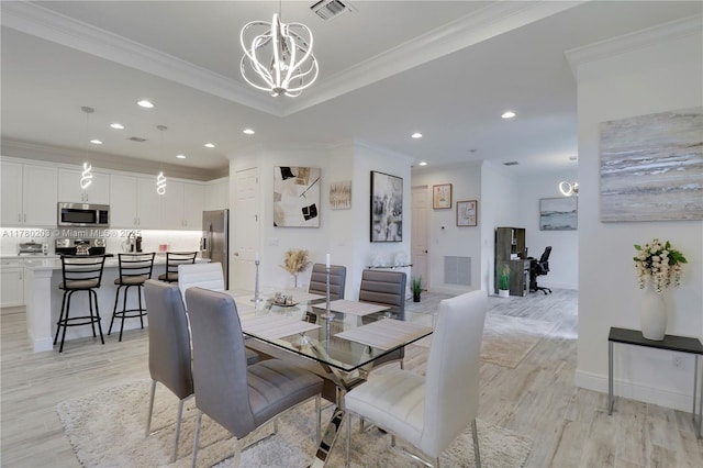 26047 SW Viterbo Way, Port St Lucie, FL 34986 - dining area with ornamental molding, recessed lighting, light wood finished floors, and an inviting chandelier