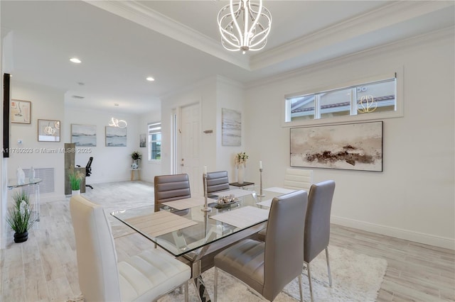 26047 SW Viterbo Way, Port St Lucie, FL 34986 - dining room with light wood finished floors, recessed lighting, a chandelier, crown molding, and baseboards