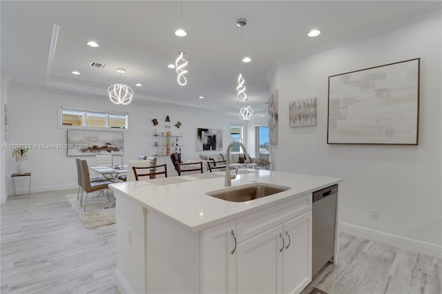 26047 SW Viterbo Way, Port St Lucie, FL 34986 - kitchen featuring recessed lighting, ornamental molding, light wood-type flooring, a sink, and visible vents