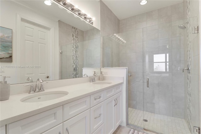 26047 SW Viterbo Way, Port St Lucie, FL 34986 - full bathroom featuring recessed lighting, a stall shower, double vanity, and a sink