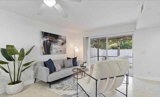 8091 NW 12th St Unit H, Margate, FL 33063 - living room with baseboards, ceiling fan, and light tile patterned flooring