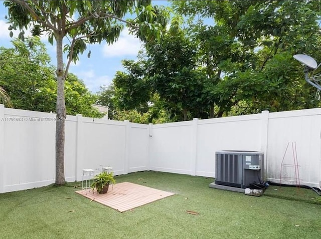 8091 NW 12th St Unit H, Margate, FL 33063 - view of yard featuring central AC
