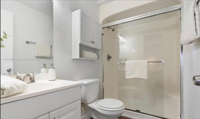 8091 NW 12th St Unit H, Margate, FL 33063 - full bath with toilet, vanity, and a stall shower