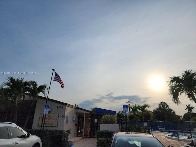 8091 NW 12th St Unit H, Margate, FL 33063 - view of pool at dusk