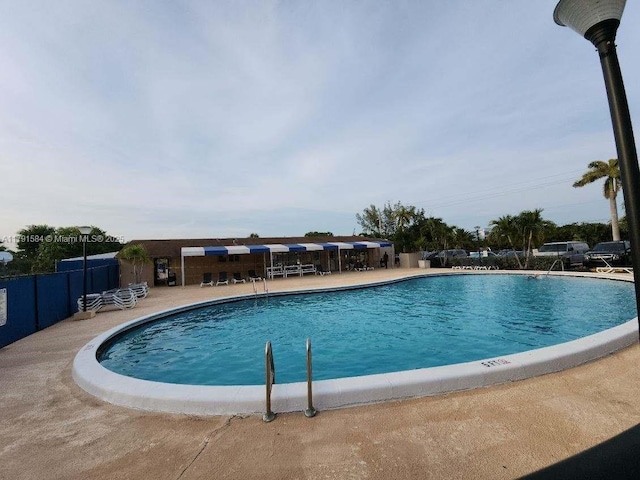 8091 NW 12th St Unit H, Margate, FL 33063 - community pool featuring a patio area