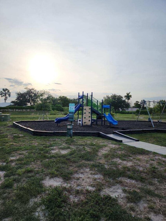 8091 NW 12th St Unit H, Margate, FL 33063 - community play area featuring a yard