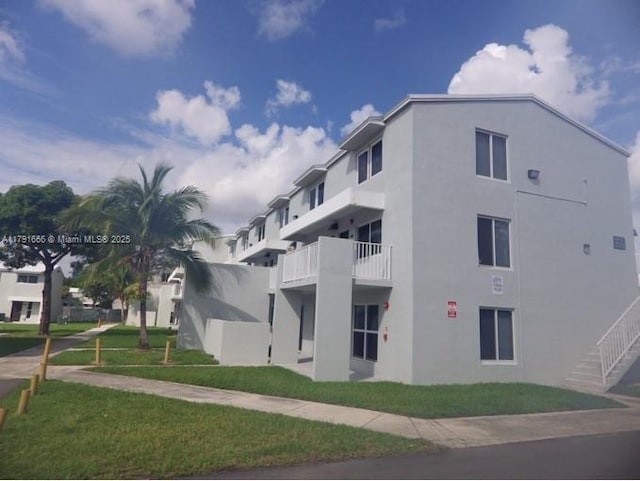 1990 NW 4th Ct Unit 8, Miami, FL 33136 - view of building exterior with stairway