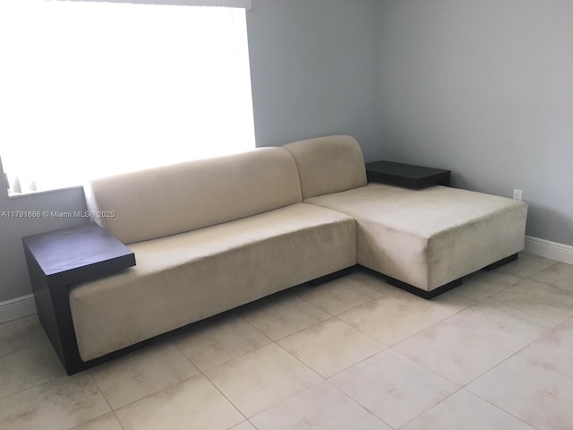 1990 NW 4th Ct Unit 8, Miami, FL 33136 - tiled living room with baseboards