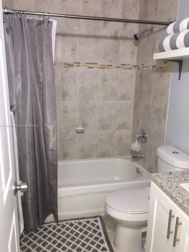 1990 NW 4th Ct Unit 8, Miami, FL 33136 - full bath with tile patterned floors, shower / bath combo with shower curtain, and toilet