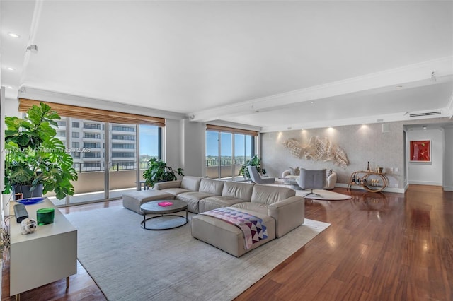 living area featuring wood finished floors and recessed lighting
