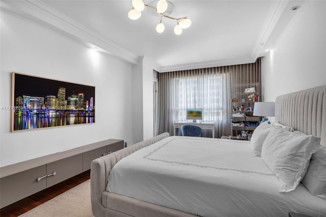 bedroom with a chandelier, dark wood-style flooring, and crown molding