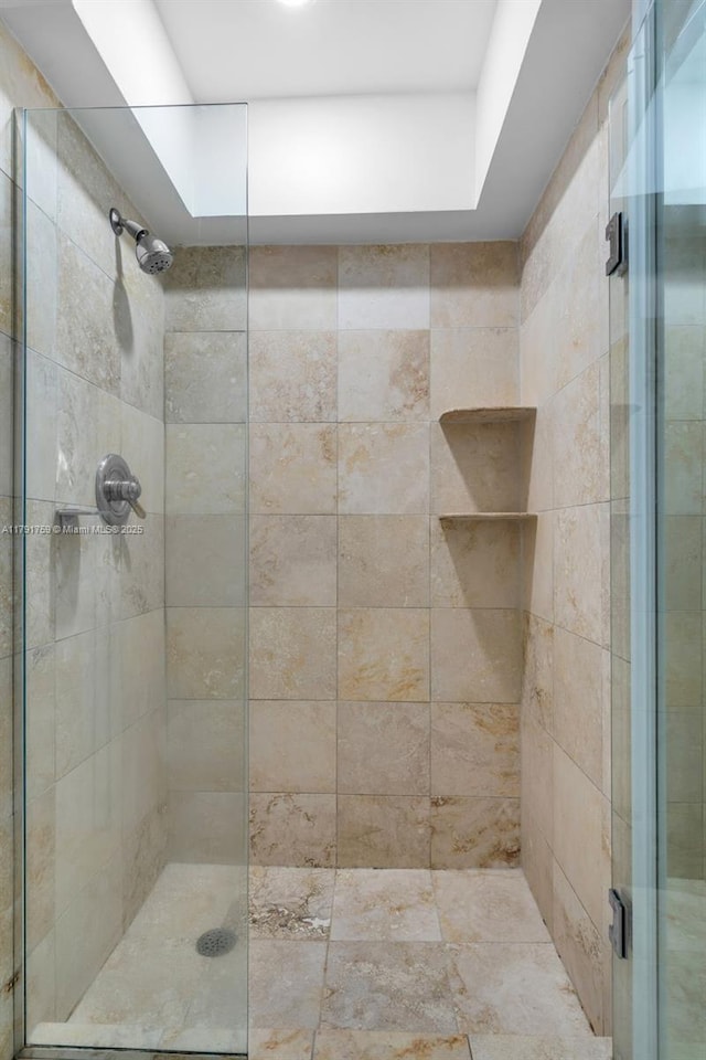 bathroom featuring a shower stall
