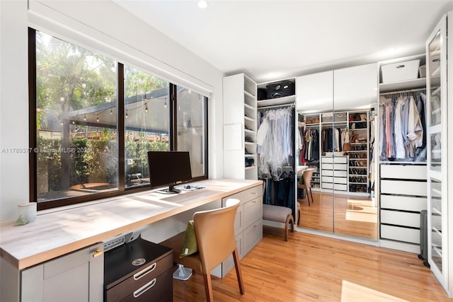 office with light wood-style floors