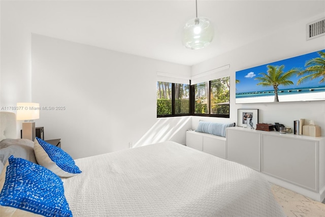 bedroom featuring visible vents